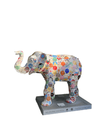 a sculpture of a colorful elephant on a pedestal