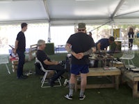 a group of people in a tent