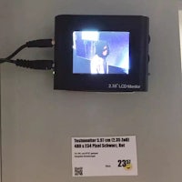 a tv with a camera attached to it